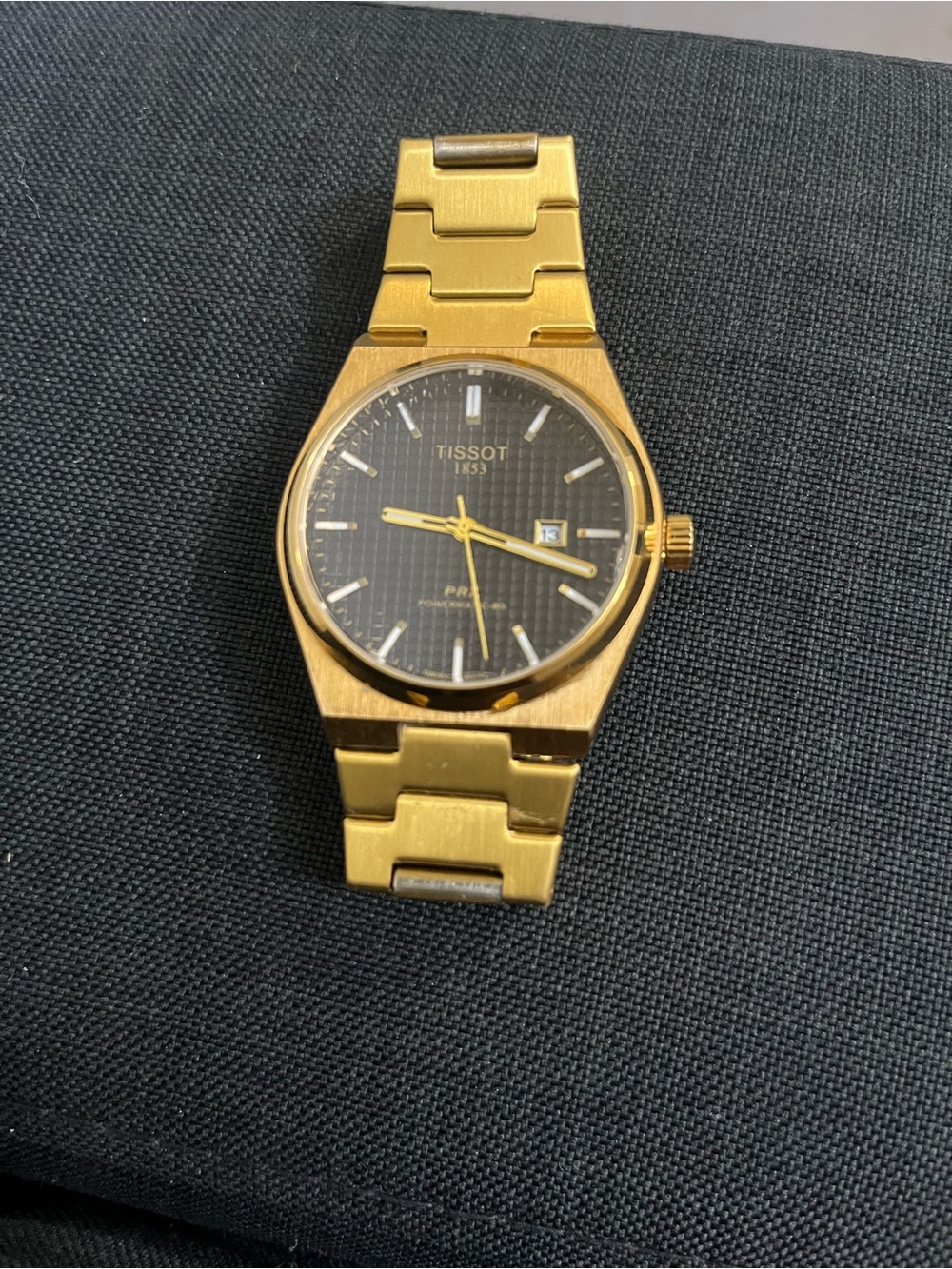 Tissot Gold Tone Watch with Black Dial and Gold Markers